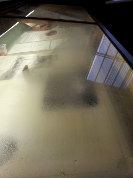 In need of conservation supplies. Serious condensation inside a showcase